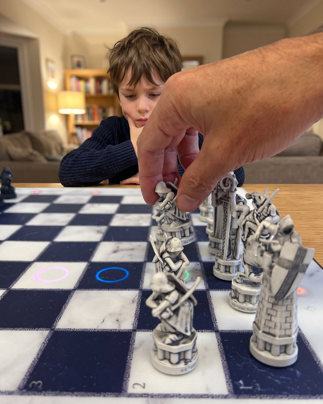 GoChess Wizard, Boy · living room · your hand moving · thinking